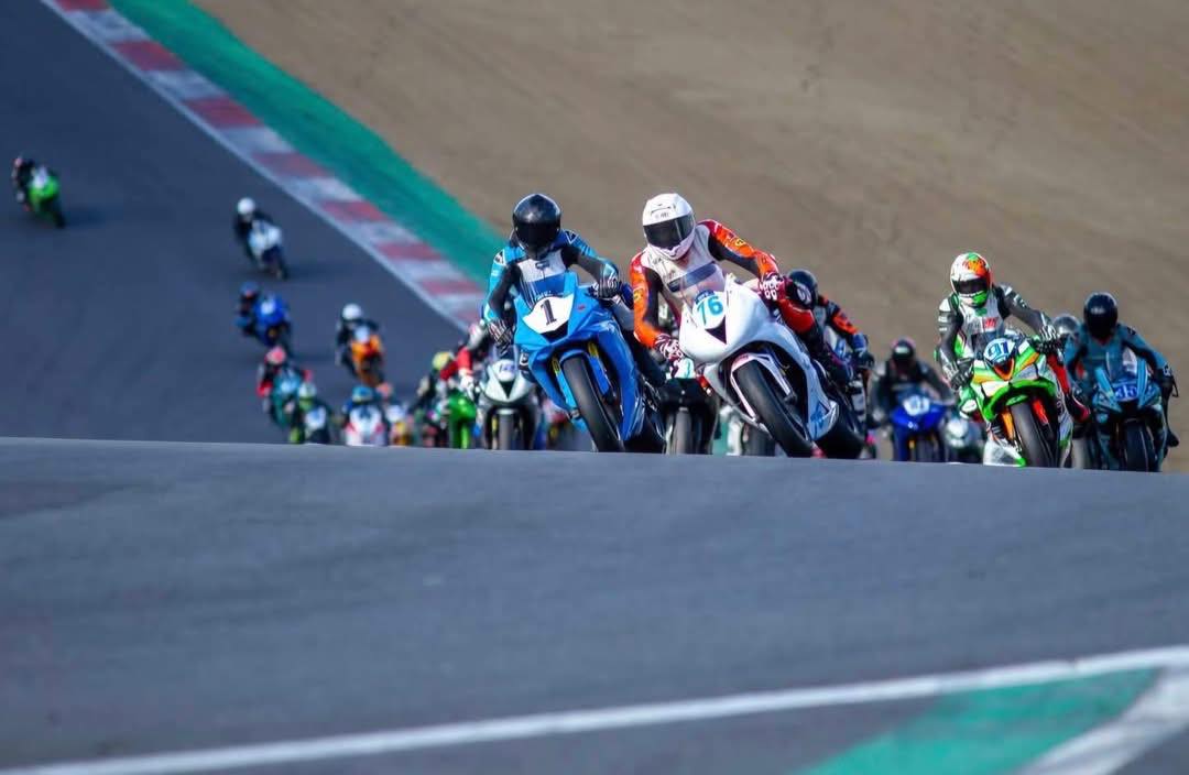 AJ cornering hard on track